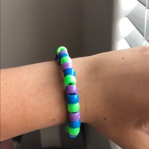 blue,green,and purple vsco bracelet or anklet.